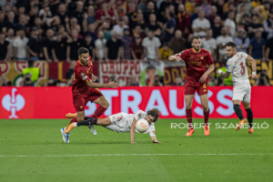 Bryan Gil of Sevilla competes for the ball with Zeki Çelik of Roma during the UEFA Europa League final at Puskás Aréna on May 31, 2023 in Budapest, Hungary.
