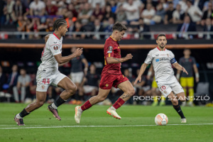 Paulo Dybala of Roma competes for the ball with Loïc Badé of Sevilla during the UEFA Europa League final at Puskás Aréna on May 31, 2023 in Budapest, Hungary.
