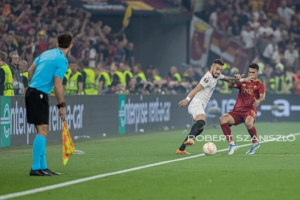 Alex Telles of Sevilla competes for the ball with Zeki Çelik of Roma during the UEFA Europa League final at Puskás Aréna on May 31, 2023 in Budapest, Hungary.
