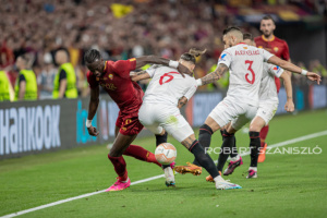 Tammy Abraham of Roma competes for the ball with Nemanja Gudelj of Sevilla during the UEFA Europa League final at Puskás Aréna on May 31, 2023 in Budapest, Hungary.
