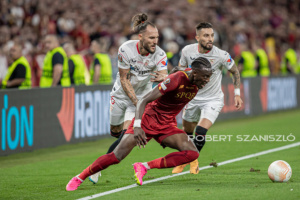 Tammy Abraham of Roma competes for the ball with Nemanja Gudelj of Sevilla during the UEFA Europa League final at Puskás Aréna on May 31, 2023 in Budapest, Hungary.
