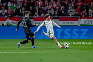 Callum Styles of Hungary competes for the ball with Blendi Idrizi of Kosovo during the friendly match at Puskás Aréna on March 26, 2024 in Budapest, Hungary.