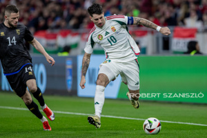 Dominik Szoboszlai of Hungary competes for the ball with Valon Berisha of Kosovo  during the friendly match at Puskás Aréna on March 26, 2024 in Budapest, Hungary.