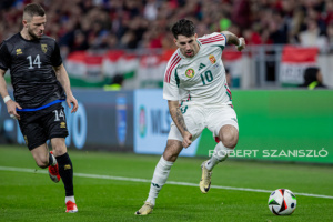 Dominik Szoboszlai of Hungary competes for the ball with Valon Berisha of Kosovo  during the friendly match at Puskás Aréna on March 26, 2024 in Budapest, Hungary.