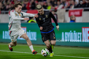 Milot Rashica of Kosovo competes for the ball with Callum Styles of Hungary during the friendly match at Puskás Aréna on March 26, 2024 in Budapest, Hungary.
