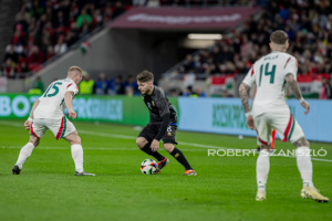 Florent Muslija of Kosovo competes for the ball with Laszlo Kleinheisler of Hungary during the friendly match at Puskás Aréna on March 26, 2024 in Budapest, Hungary.