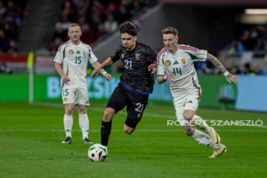 Donat Rrudhani of Kosovo competes for the ball with Bendegúz Bolla of Hungary during the friendly match at Puskás Aréna on March 26, 2024 in Budapest, Hungary.